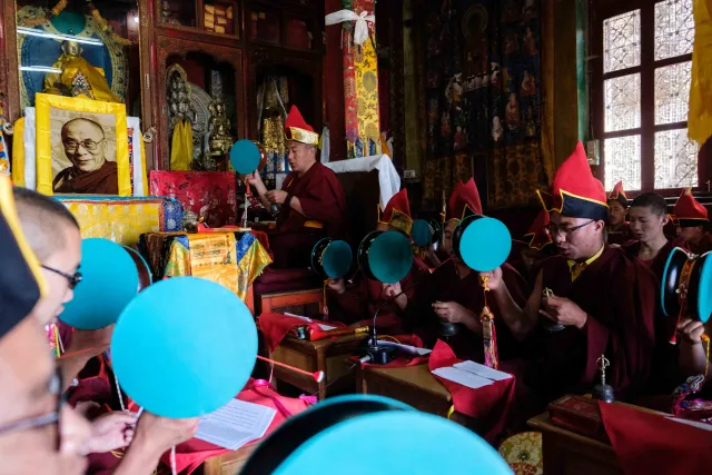 Ceremonial ritual performance with traditional Tibetan drums