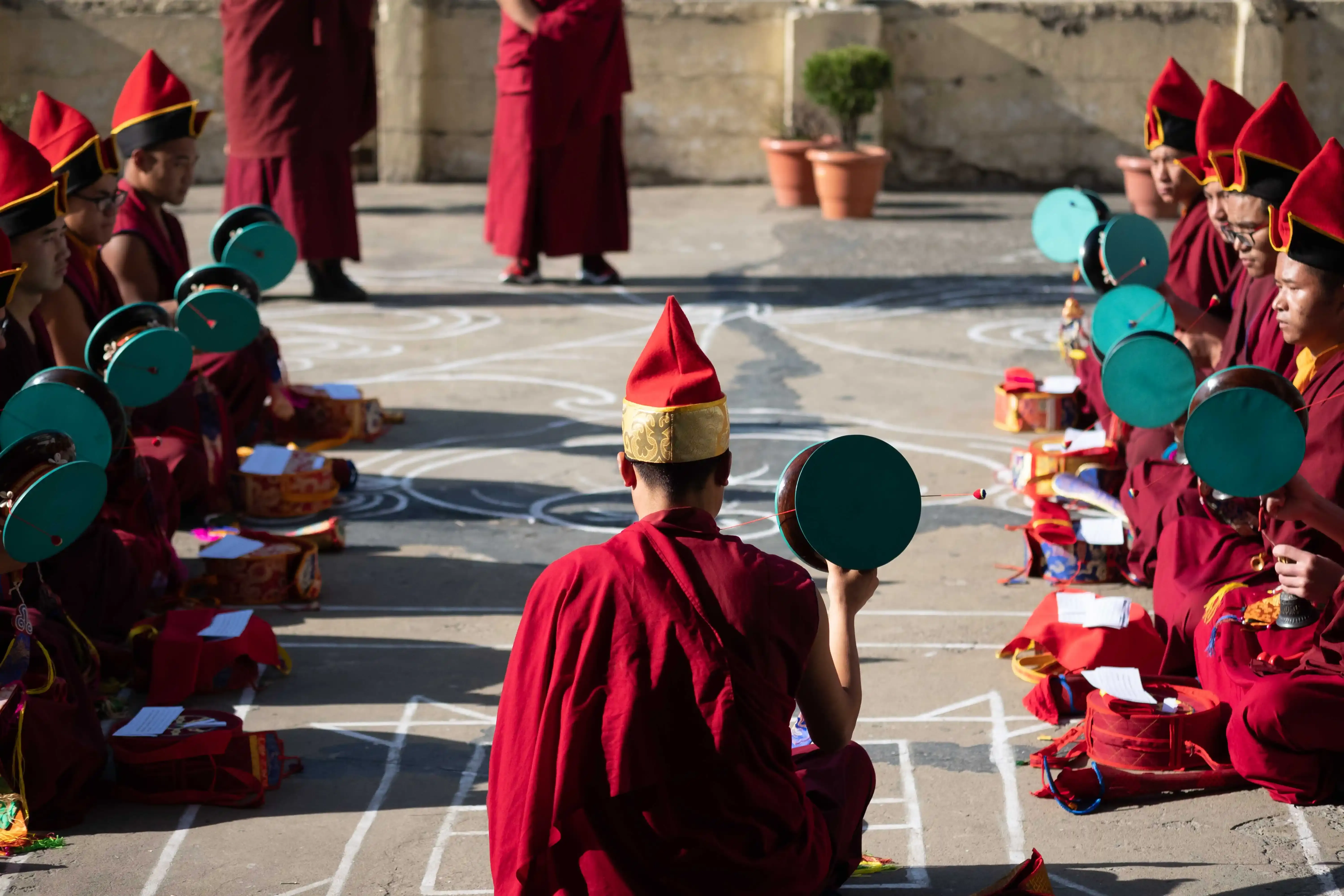 Resident monastic sangha gathered in the courtyard of Main Jonang Takten Phuntsok Choeling, Sanjauli, Shimla